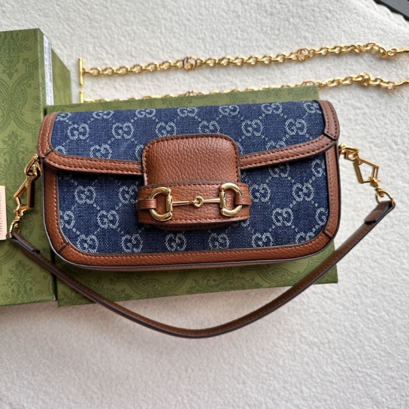 G*u*i top handle bags